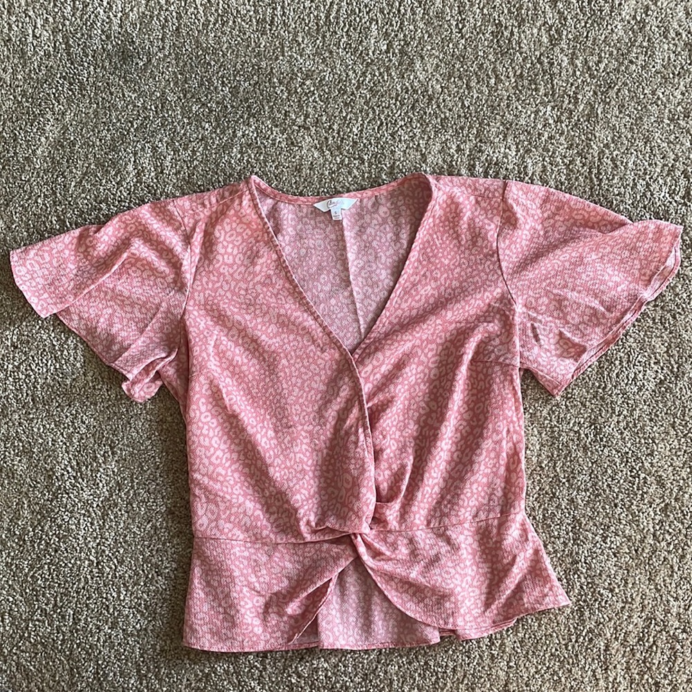 Pink cheetah print candies blouse.